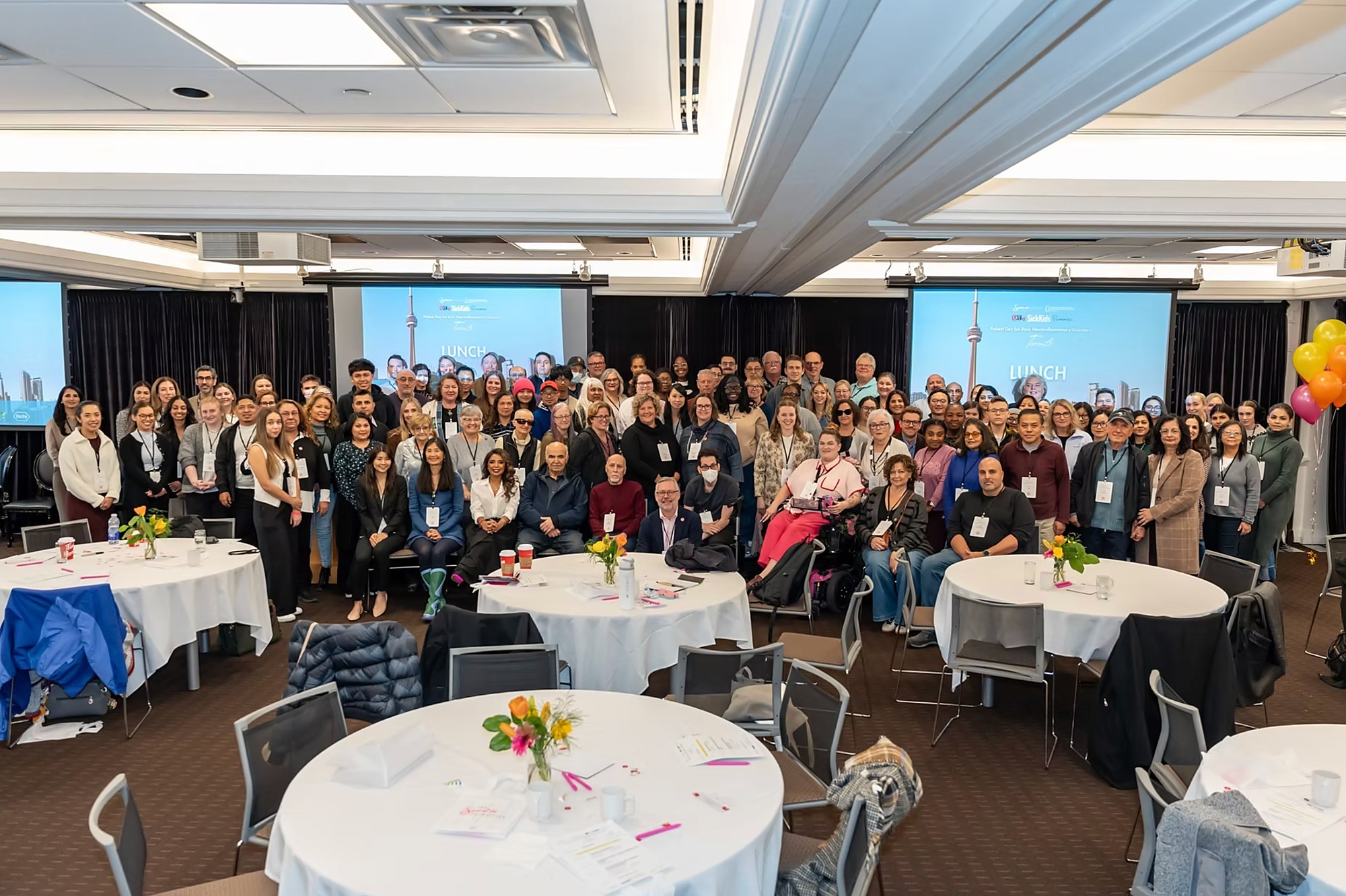 Large group photo from a patient education day event